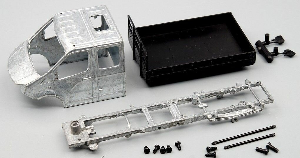 Сборная модель автомобиля ГАЗель Next А22R33 бортовой с тентом — фото 1