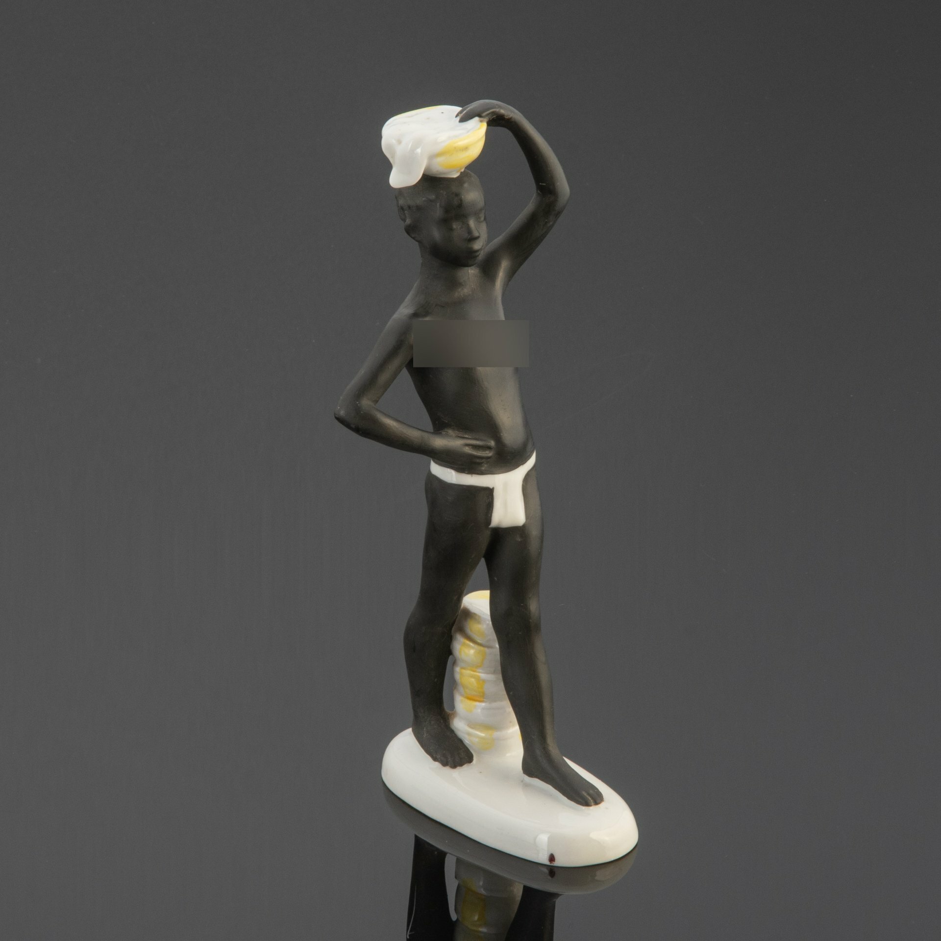 Статуэтка "Африка" (мальчик-негр с корзиной на голове) скульптор Г. С. Столбова
