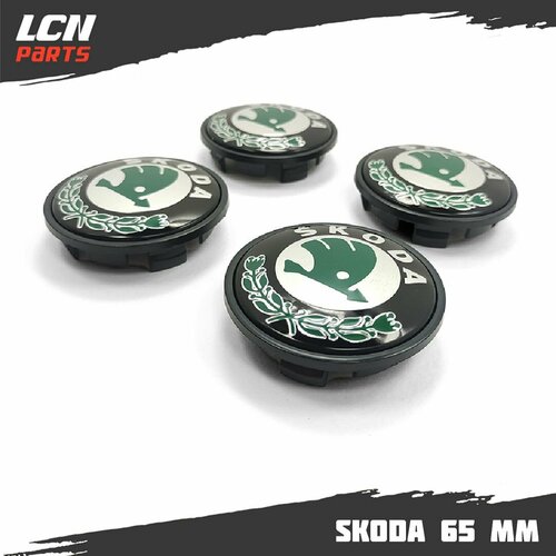 Колпачки заглушки на литые диски Шкода 65мм 655612 3B7 601 171 с зелёным логотипом 839₽