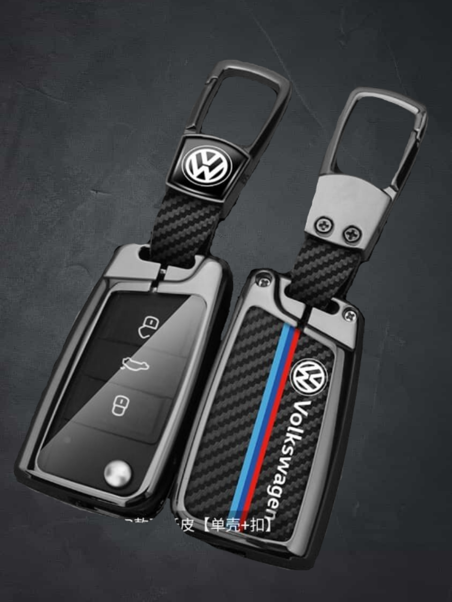 Защитный чехол для смарт-ключей Volkswagen (Golf VII 2012-2017/ Golf VII рестайлинг 2017-2020/ Touran III 2015/ Tiguan II 2016-2020/ Tiguan II рестайлинг 2020/ Passat B8 2014-2020/ Crafter L4 II)) с логотипом и брелком