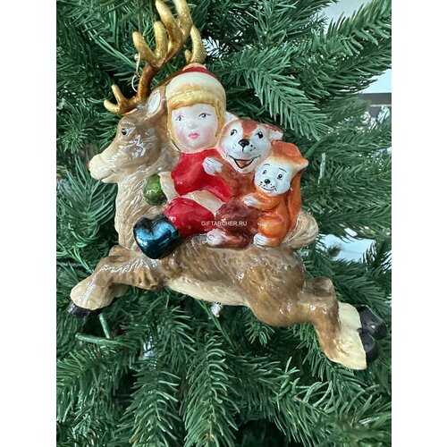 Девочка с друзьями на олене