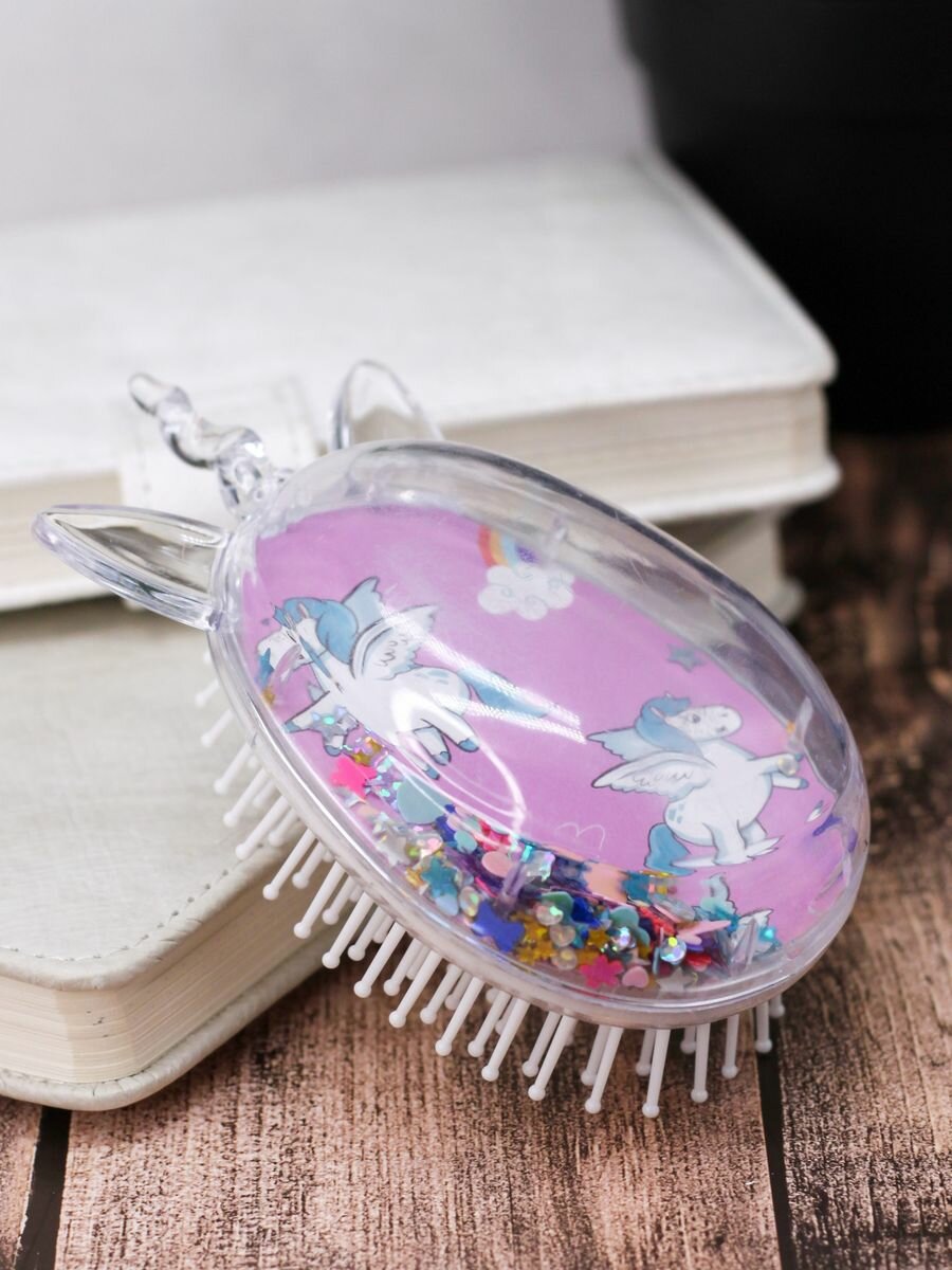фото Расческа для волос Seqvins head unicorn green