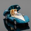 Модель автомобиля Chevrolet Astro 1 в оригинальной коробке (масштаб 1:43) - изображение