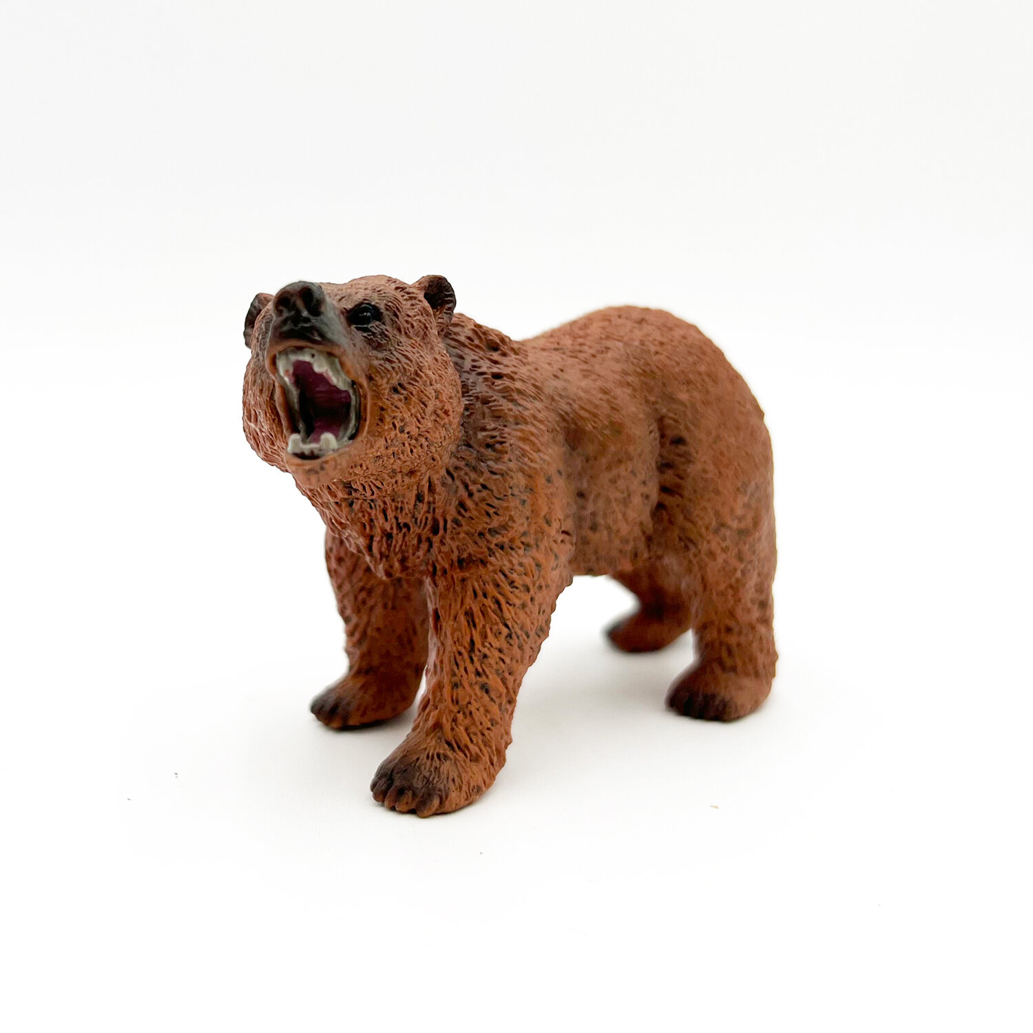 фото Фигурка Медведь гризли (идет и рычит)