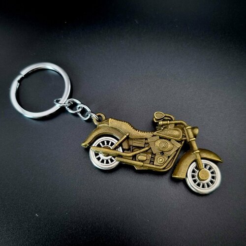 Славянский оберег брелок гладкая фактура серебристыйжелтый 419₽