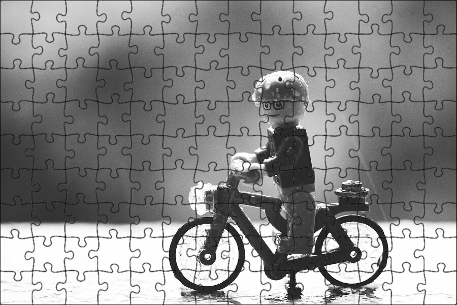 Магнитный пазл "Конструктор лего, игрушки, велосипед" на холодильник 27 x 18 см.