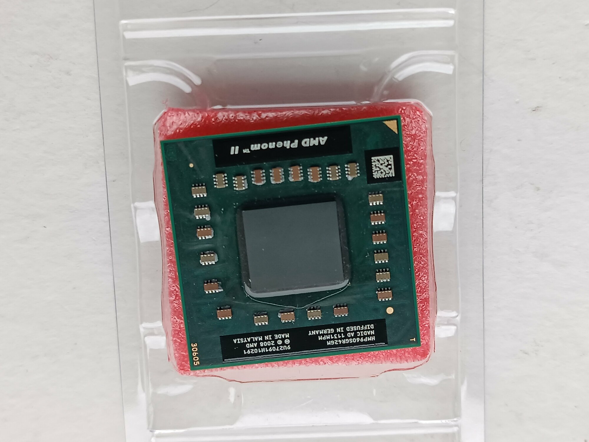 AMD Phenom II P960, 1.8GHz, Champlain, 25w, 4 ядра, 4 потока, Socket S1, процессор для ноутбука — фото 1