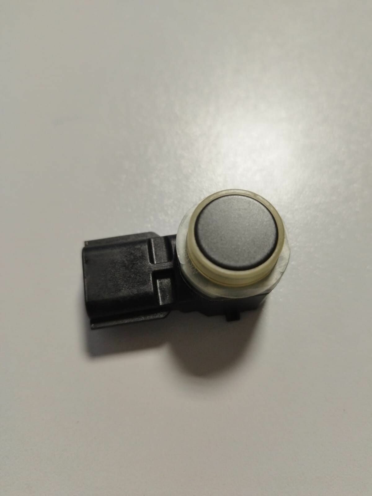 284384CL0A Датчик парктроника ультразвуковой Nissan оригинал