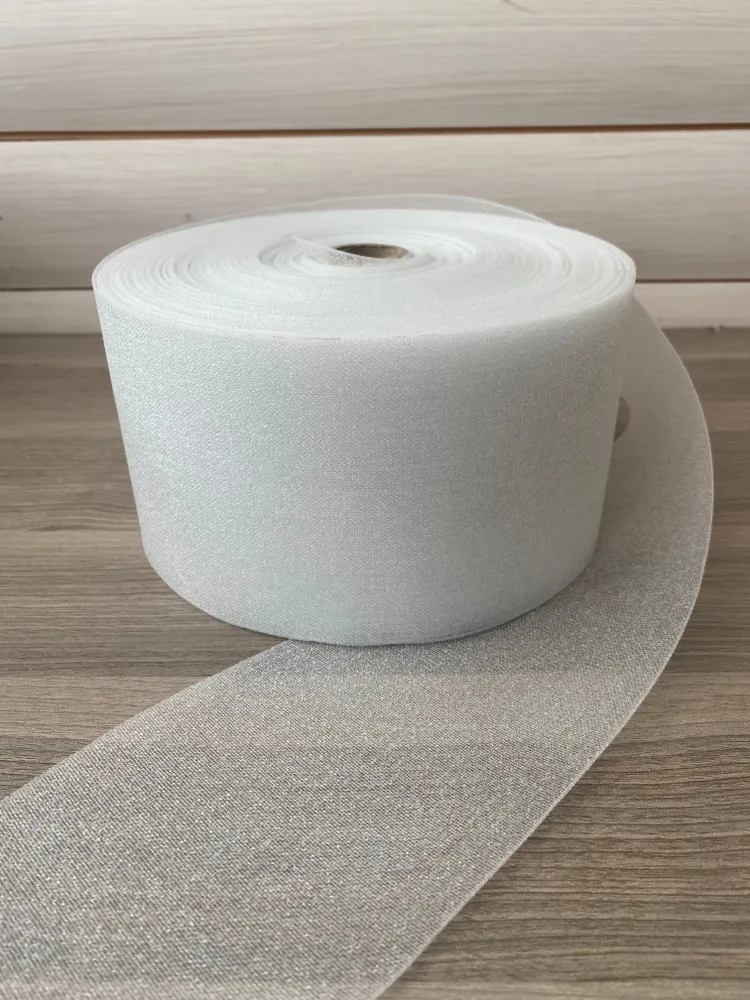 фото Люверсная лента премиум качества, прозрачная, термоклеевая, ширина 10 см, (5м рулон)