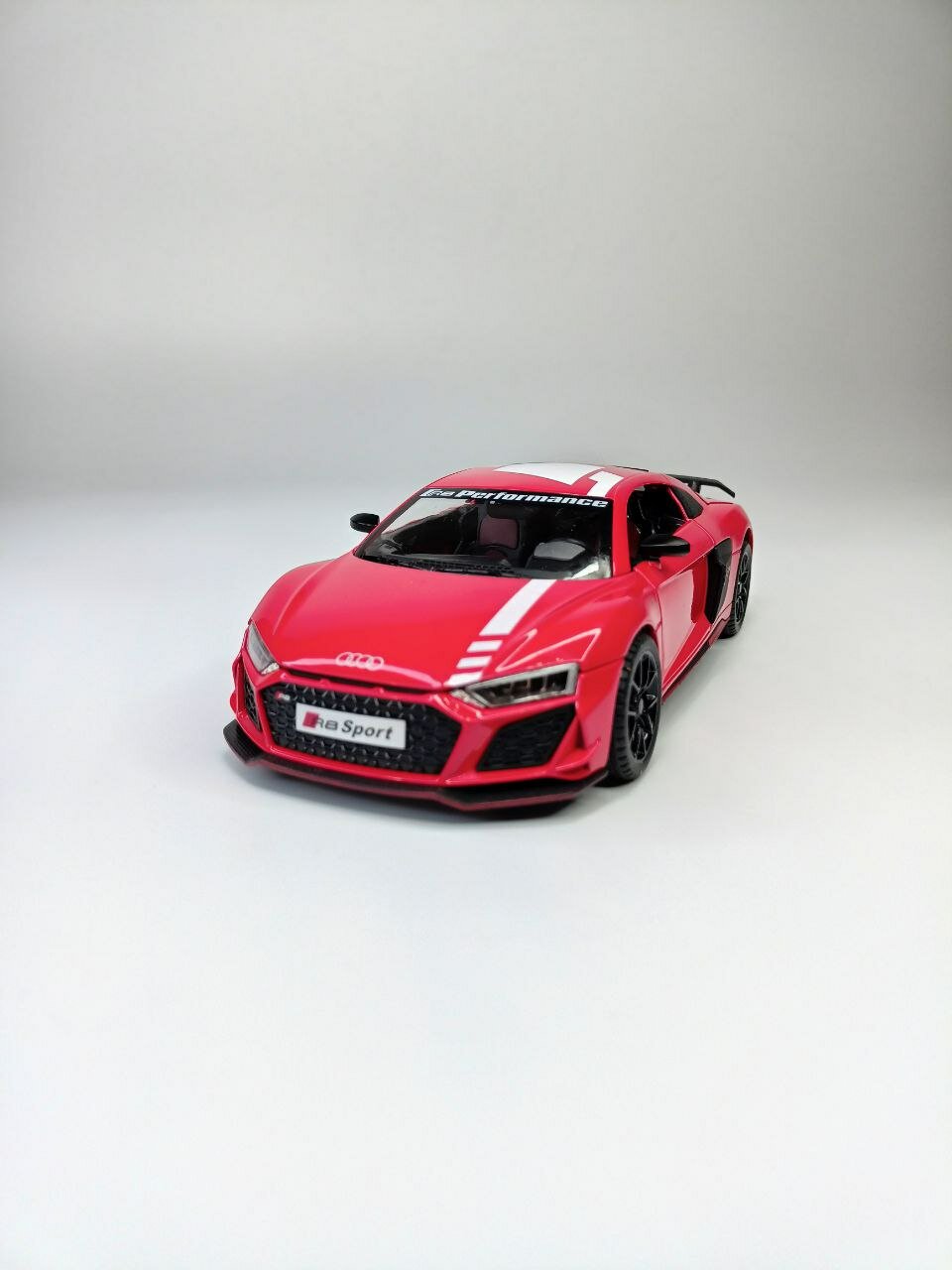 Коллекционная машинка игрушка металлическая Audi R8 для мальчиков масштабная модель 1:24 красная