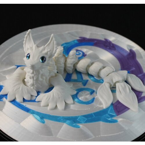 Лисофей подвижный дракончик Чудохвост развивающая игрушка-антистресс цвет Белоснежка 1500₽