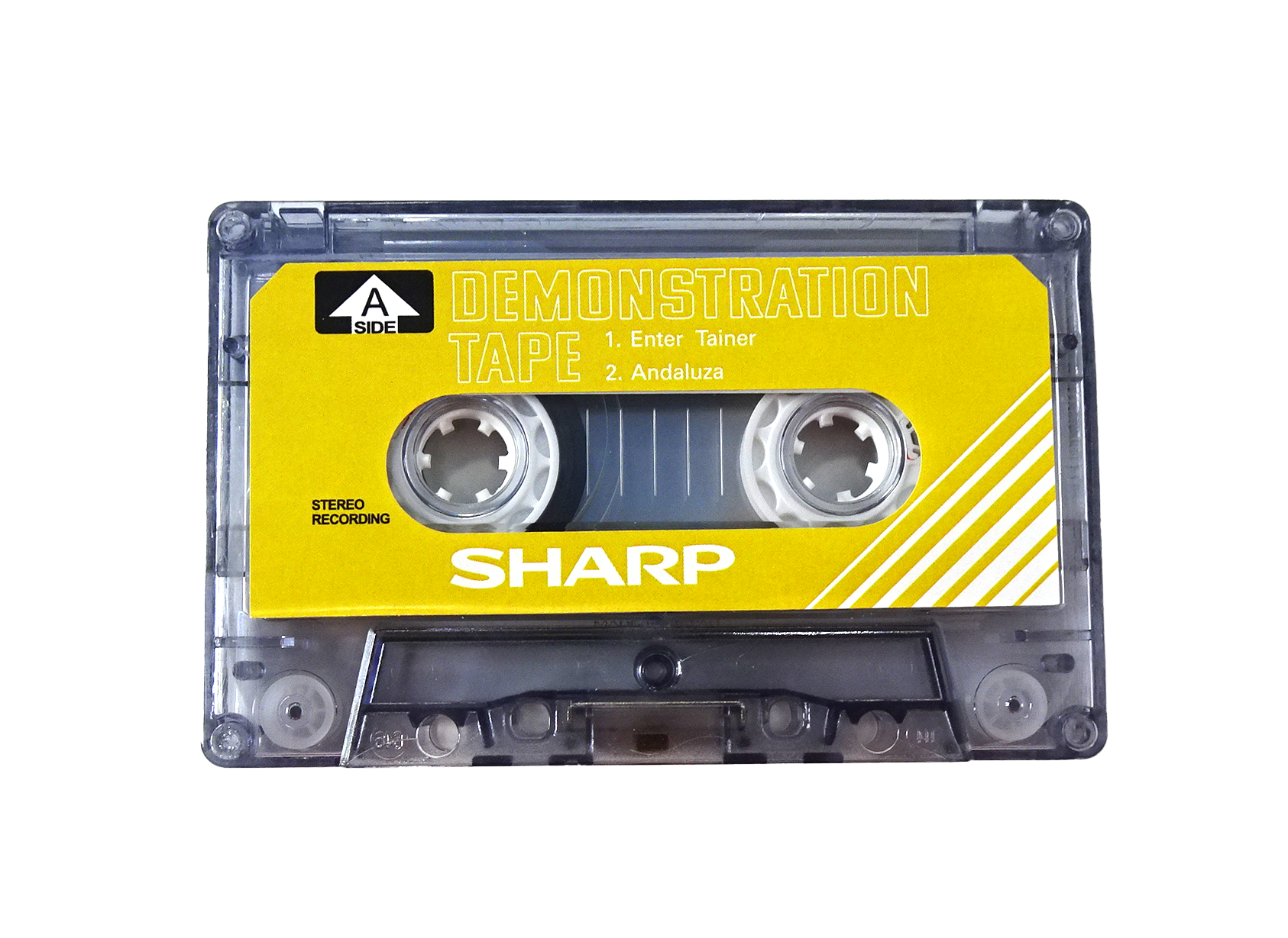 Аудиокассета SHARP демонстрационная жёлтая 20 минутная для магнитофонов SHARP. Бланк.