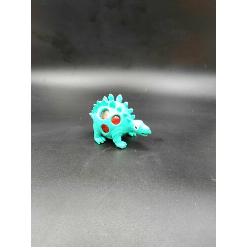 Антистресс игрушка динозавр стегозавр бирюзовый с орбизами 217₽