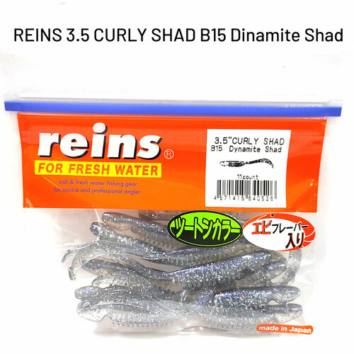 Силиконовая приманка REINS CURLY SHAD 3.5 Цв. B15-Dynamite Shad мягкая приманка reins curly shad 3 5 цв b87 stickleback 11 шт уп