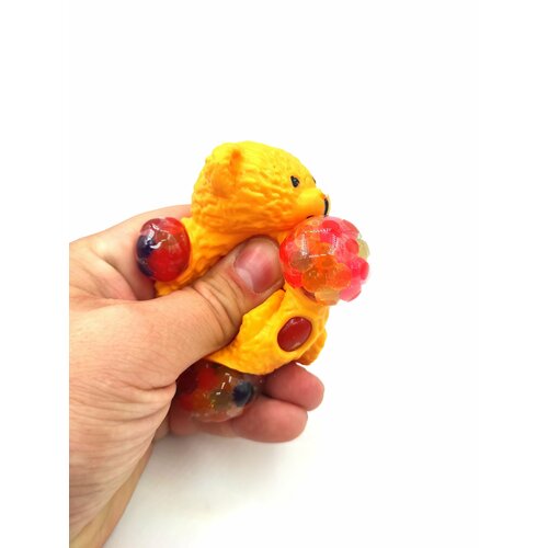 Игрушка-антистресс мишка оранжевый с цветными орбизами