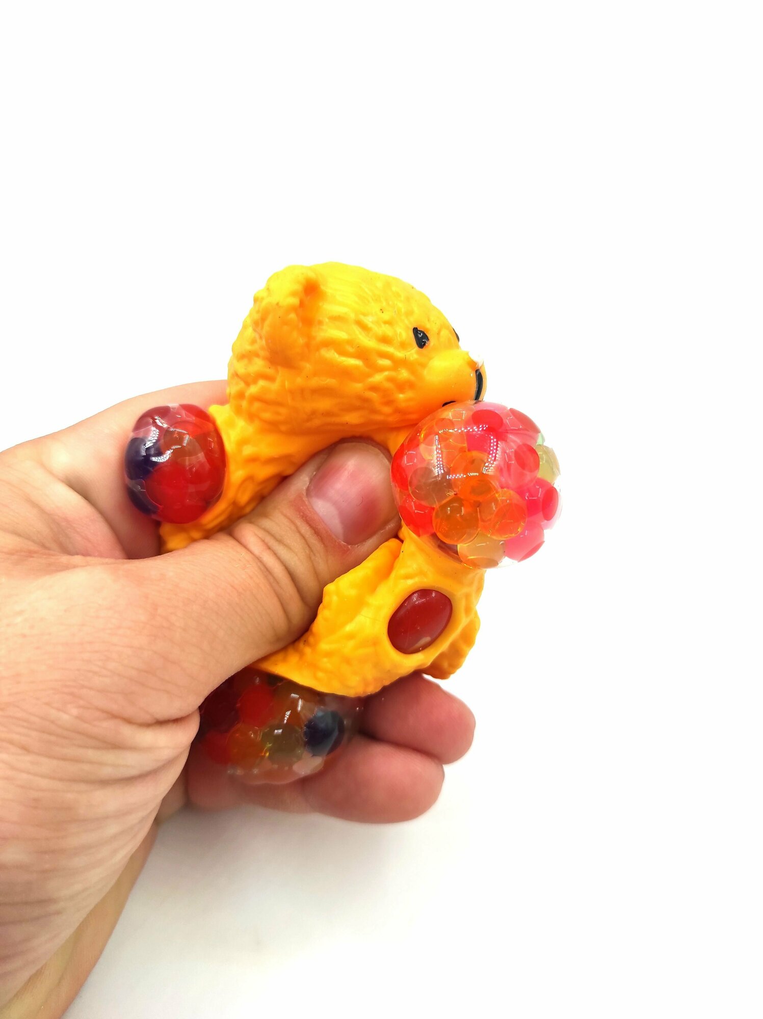 Игрушка-антистресс мишка оранжевый с цветными орбизами