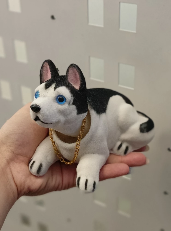 Качающаяся собака собака качает головой хаски