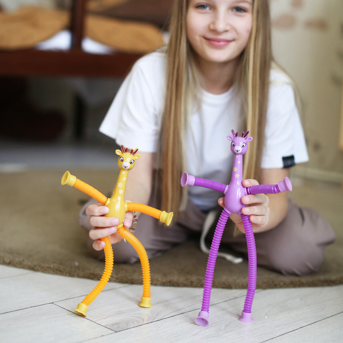 Игрушка-олень "Поп-трубки" с пружинками на присосках, оранжевый/фиолетовый 2 штуки