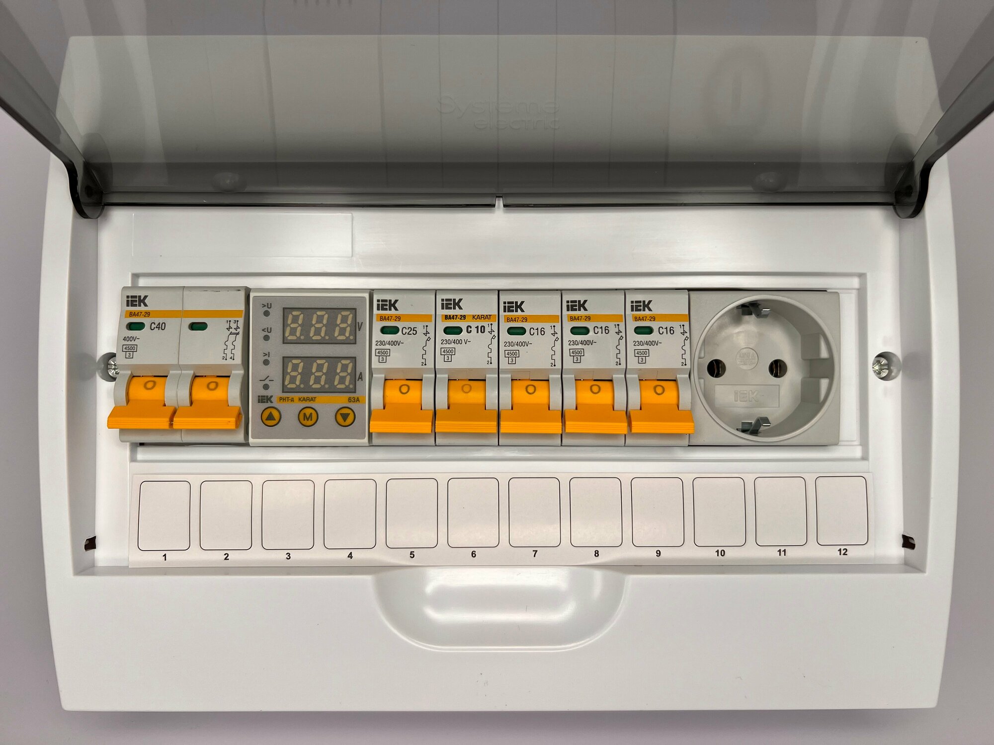 фото Щит готовый электрический распределительный, навесной, пластик белый. 12 модулей