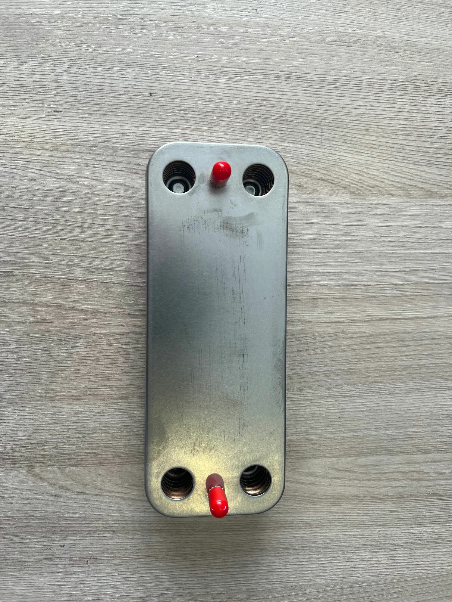 фото Пластинчатый теплообменник ГВС (12 пластин) для котлов Kentatsu Nobby Smart 12927600000227, Navien Навьен Deluxe S 30017721A