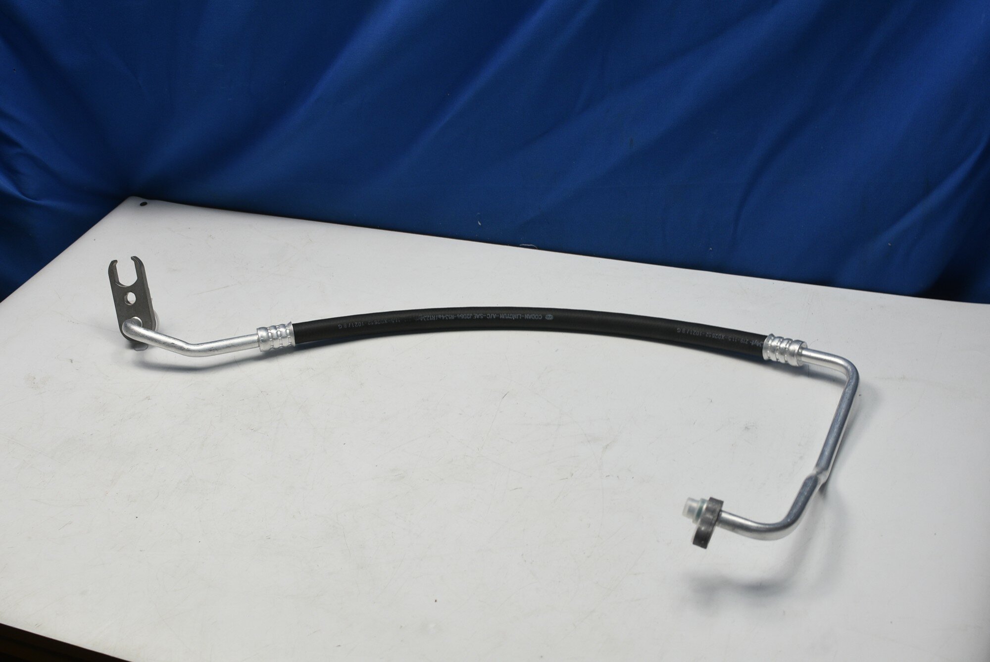 фото Трубка системы кондиционера Chevrolet Lacetti 2003-2013 (от компрессора к радиатору)