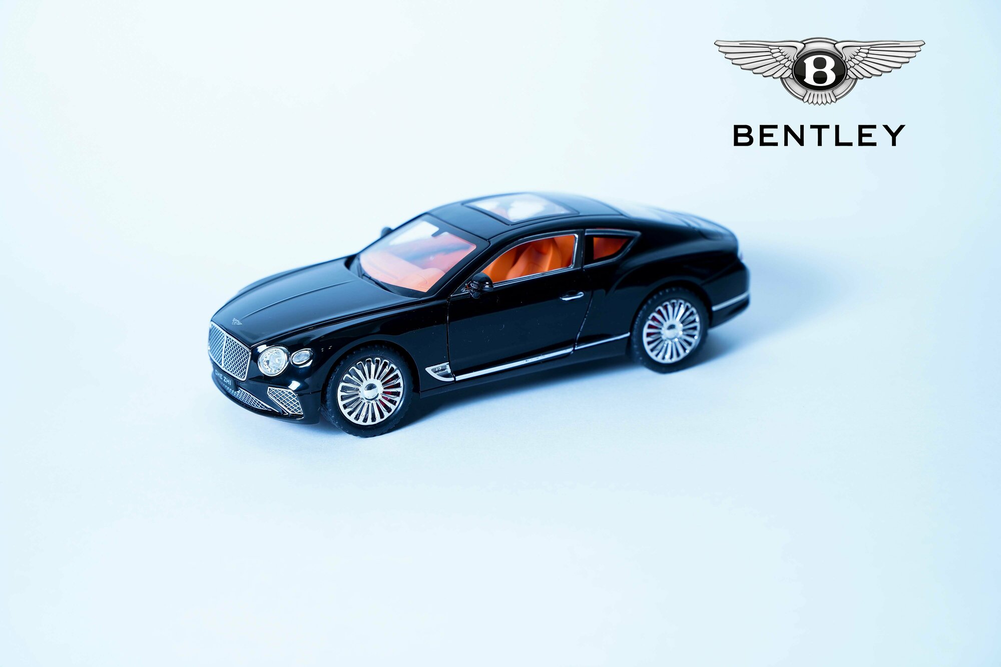 Коллекционная машинка игрушка металлическая BENTLEY CONTINENTAL GT с дымом в масштабе 1:24 цвет черный