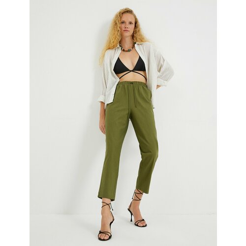 фото Брюки koton, размер 34, хаки