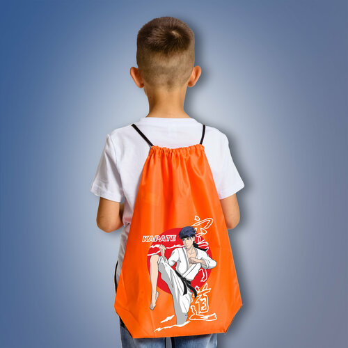 фото Сумка мешок aika с изображением каратиста и надписью карате, оранжевого цвета aika "яркость и стиль в спорте"