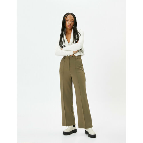 фото Брюки koton, размер s, хаки