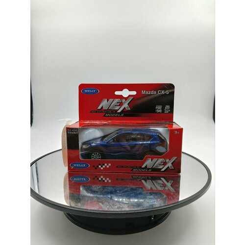 Мод. маш. 1:38 WELLY MAZDA CX-5 43729 W Инерционный механизм. Синий. welly модель машины 1 34 39 mazda cx 5 43729 серебристая