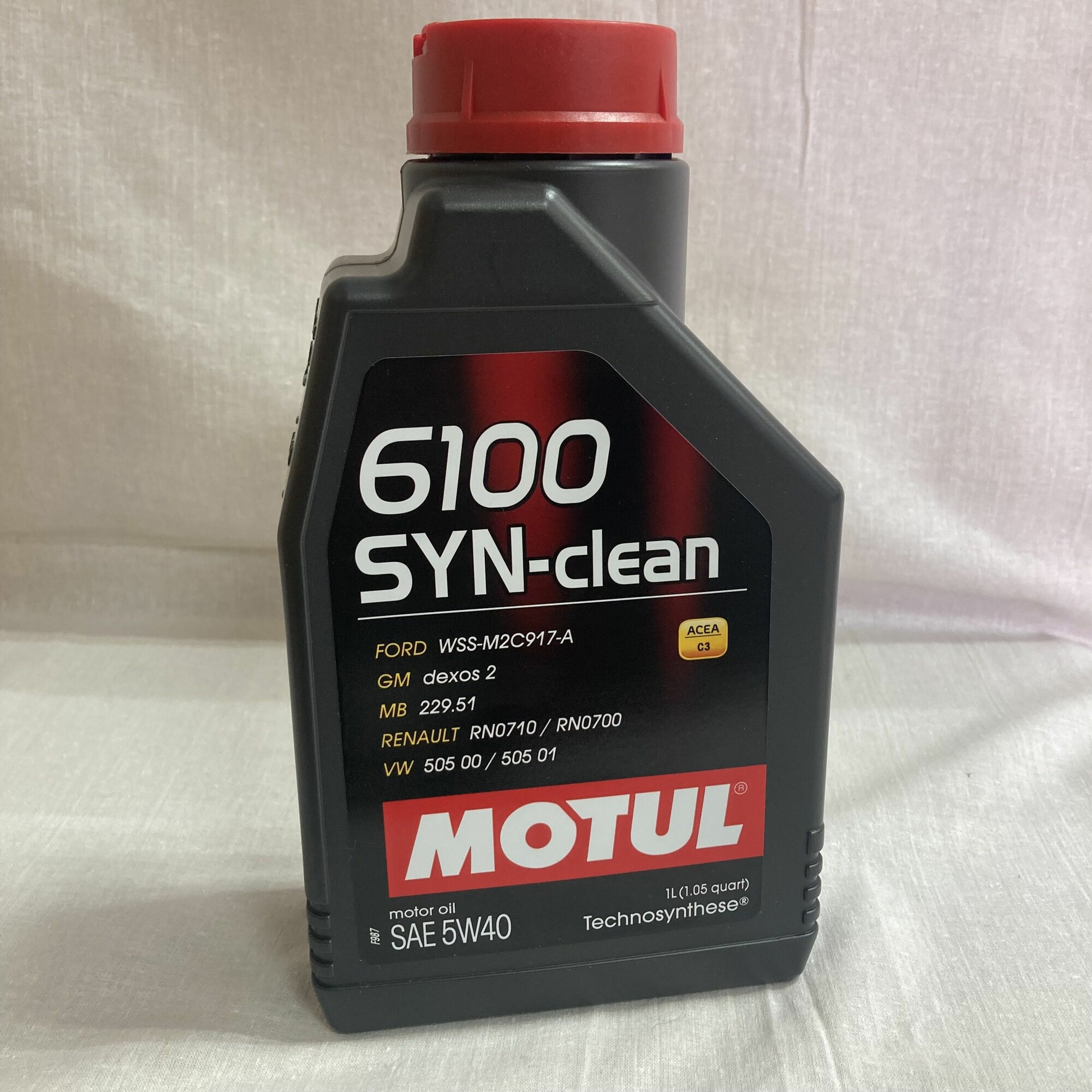 фото Полусинтетическое моторное масло Motul 6100 SYN-clean 5W40