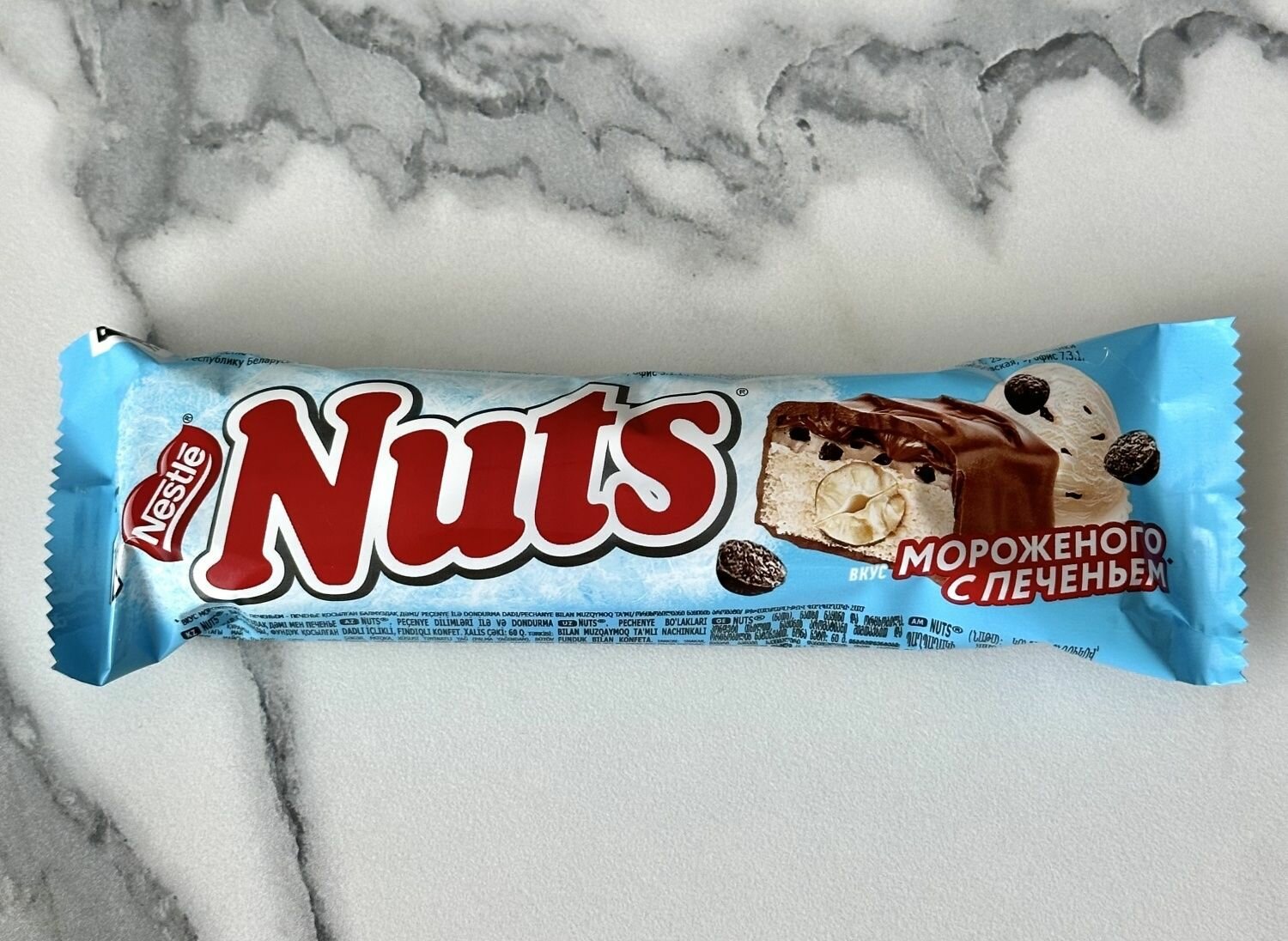 Шоколадный батончик Nuts Duo фундук мороженное с печеньем, 60г 12 штук - фотография № 1