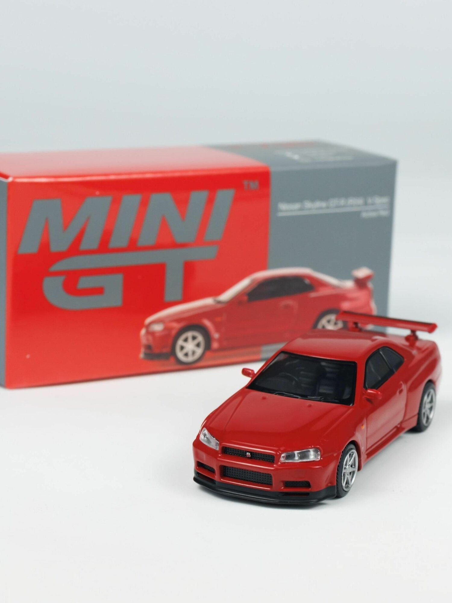 Машинка TSM Mini GT 1/64 #796 Nissan Skyline GT-R (R34) V-Spec