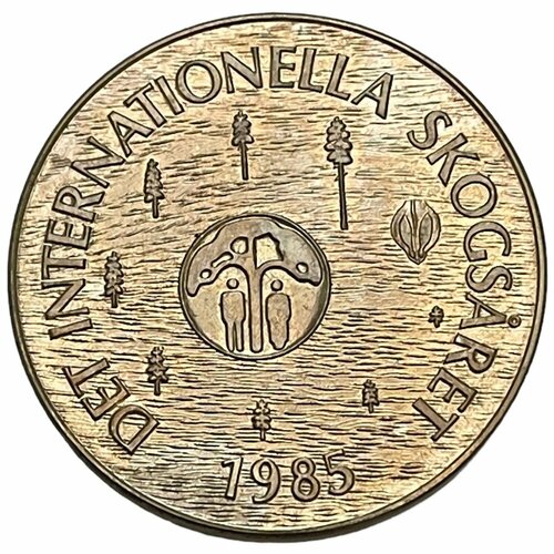 Швеция 100 крон 1985 г. (Международный год леса) клуб нумизмат монета 200 крон швеции 1998 года серебро 25 лет правления карла xvi густава