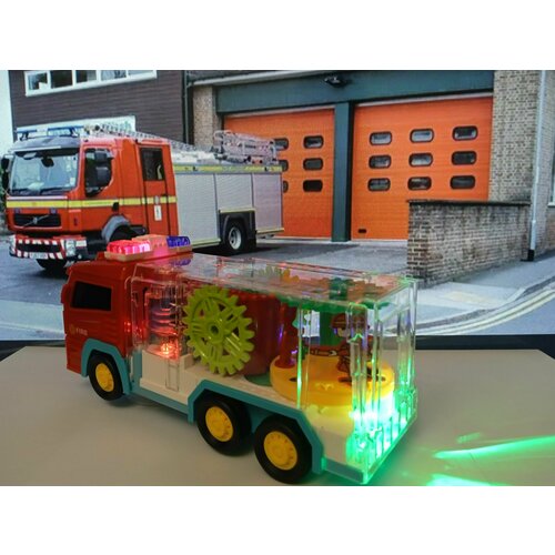 Машина пожарная с шестеренками, световыми и музыкальными эффектами прозрачный паровозик с шестеренками световыми и музыкальными эффектами