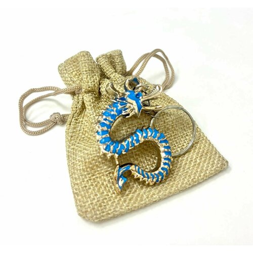 фото Брелок брелок для ключей символ года 2024 дракон в подарочной упаковке сиреневый, подарочная упаковка, тиснение, audi, голубой bruoni
