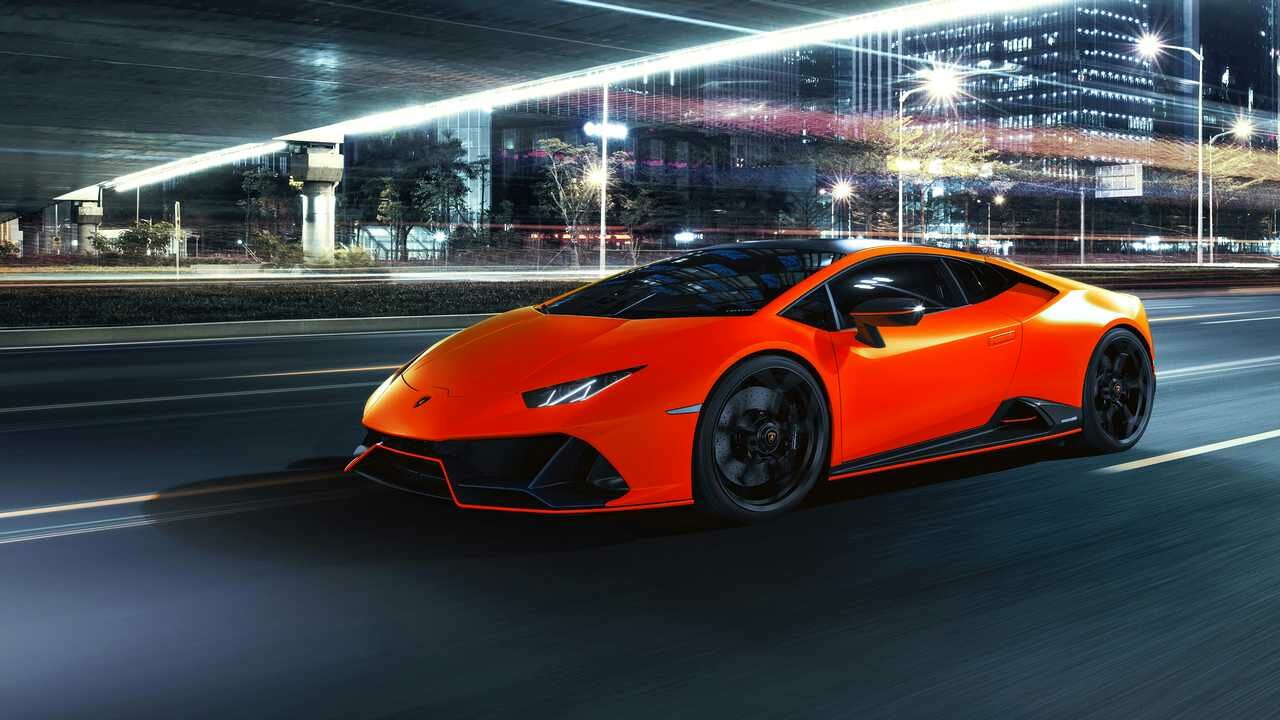 Картина на холсте 60x110 Альянс Лес "Оранжевый автомобиль Lamborghini" на подрамнике / интерьер/ декор