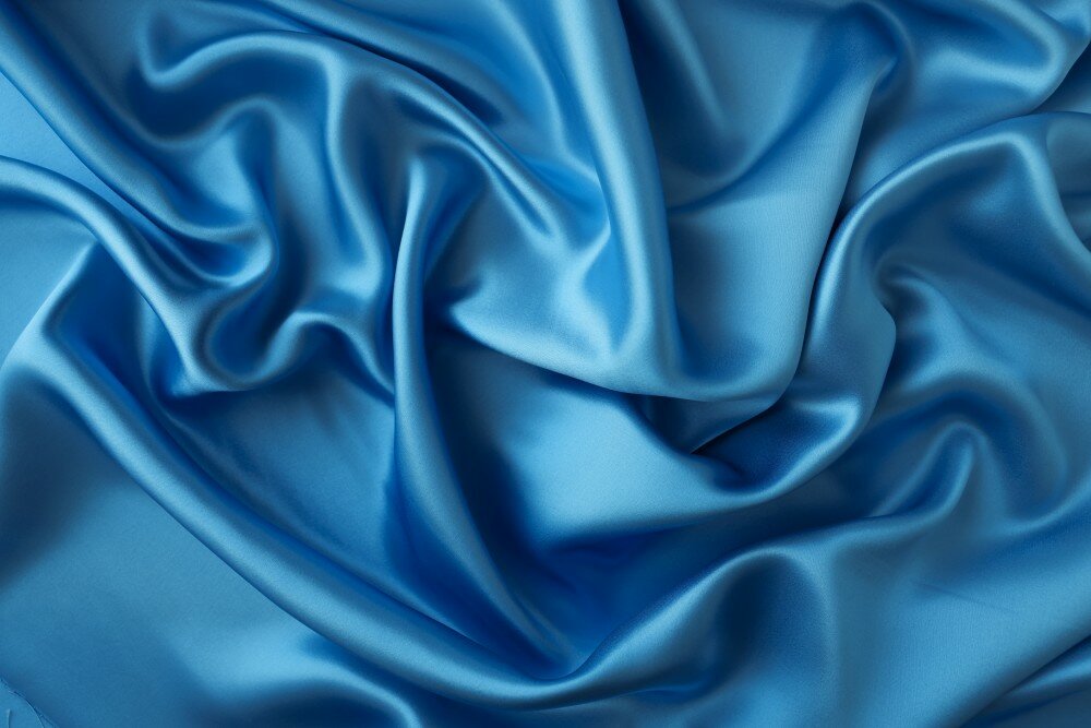 Ткань голубой атлас