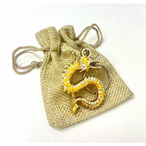 фото Брелок брелок для ключей символ года 2024 дракон в подарочной упаковке сиреневый, подарочная упаковка, тиснение, cadillac, желтый bruoni
