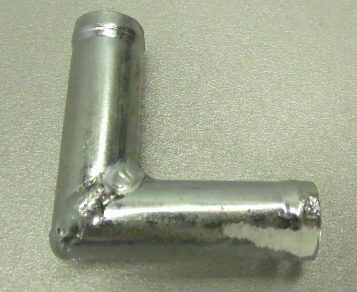 Трубка соединитель для патрубков уголок 90* 12x12 L= 35x35 (металл)