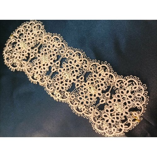 фото Плетеный браслет, размер 18 см, персиковый нет бренда