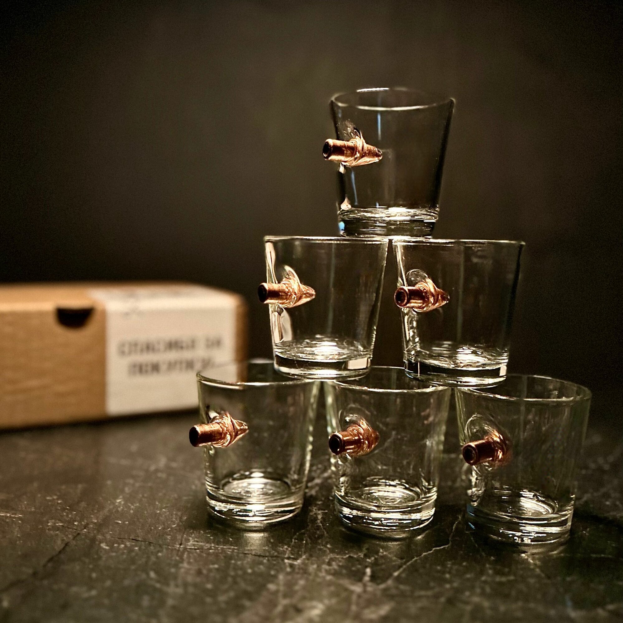 фото Шесть рюмок с пулей