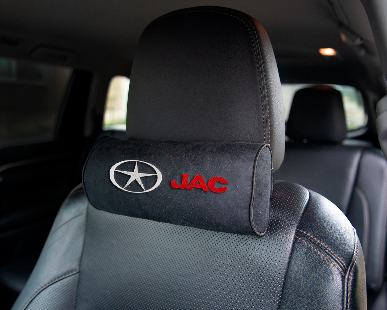 Автомобильная подушка-валик на подголовник алькантара Black c вышивкой JAC - VJC02