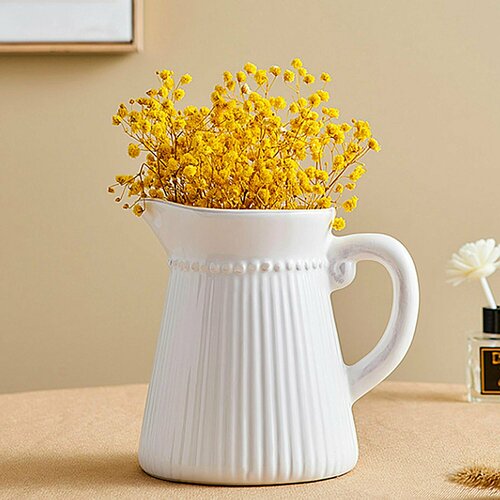 Ваза в виде кувшина высота 16 см покрытая керамической глазурью белая 2970₽