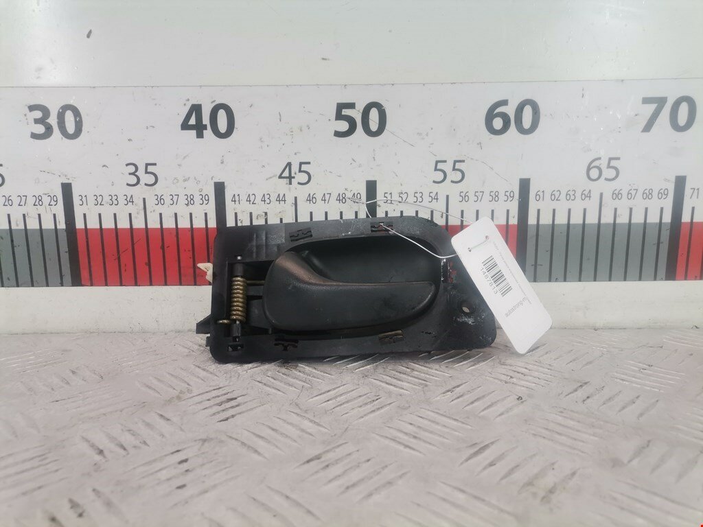 Ручка двери внутренняя передняя левая Renault Laguna 1 7700823286 арт. 1487813