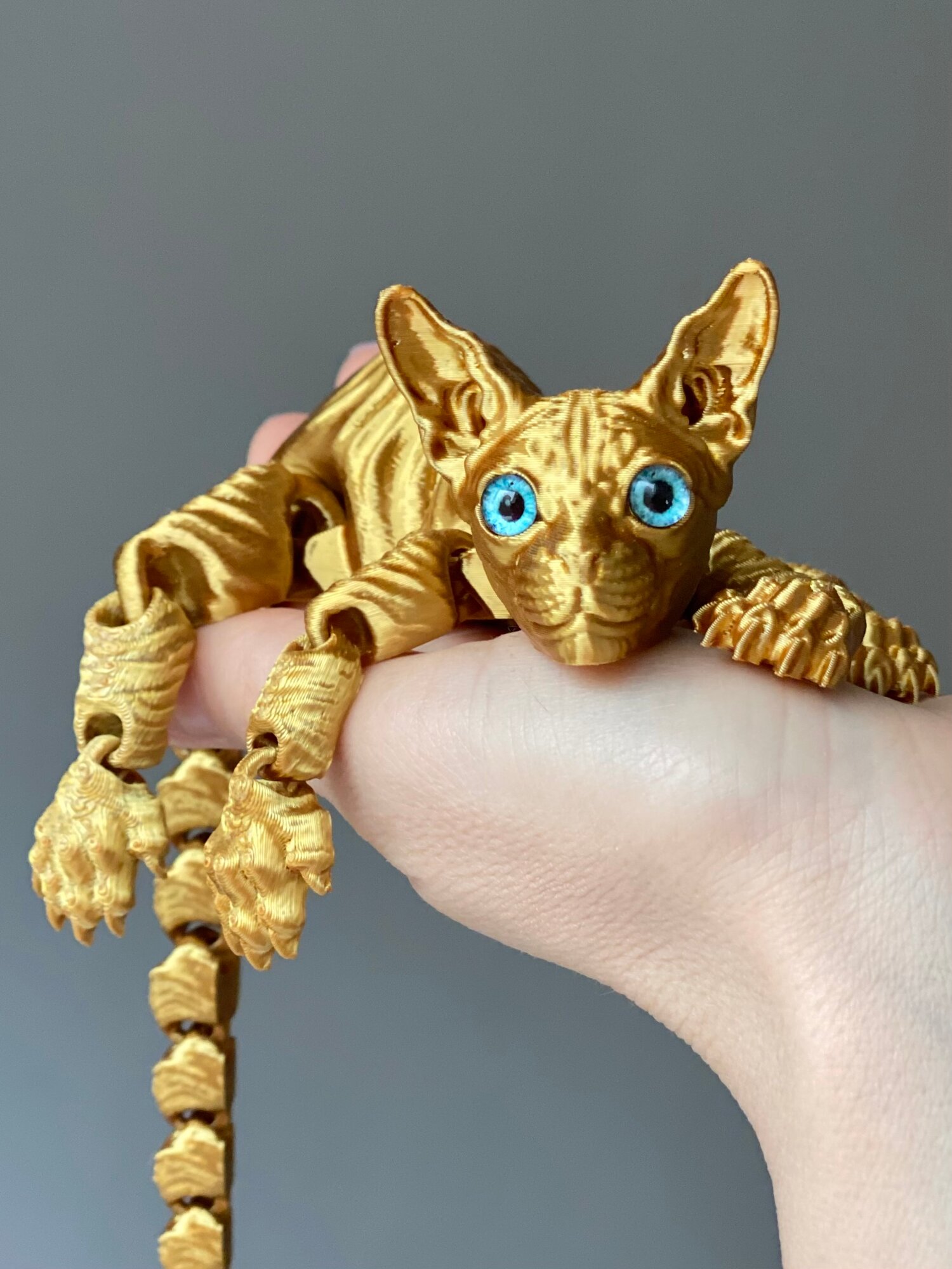 Игрушка антистресс Кот сфинкс подвижный, пластик, золотой, 22,5см, стеклянные глаза