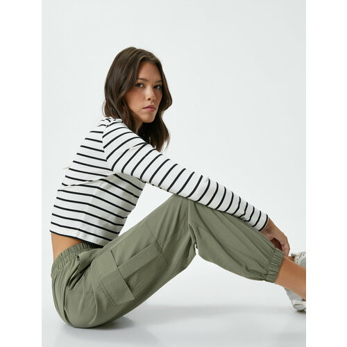 фото Брюки koton, размер 48, хаки