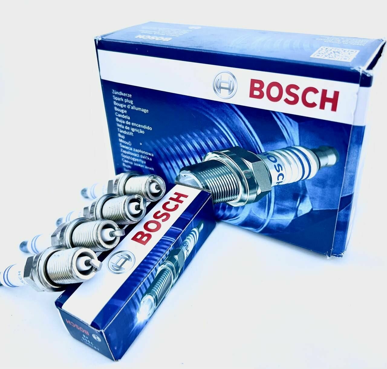 Комплект свечей зажигания Bosch 0242235666 FR7DC+ 4 штуки — фото 4