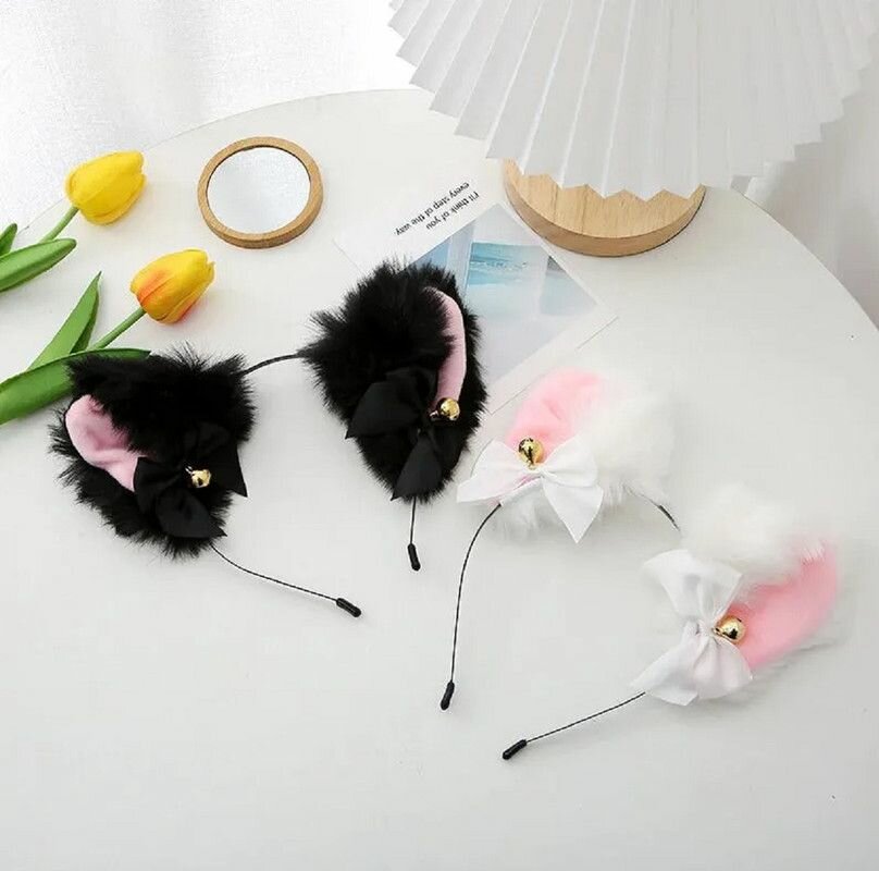 фото Милые пуховые ушки с колокольчиком и бантиком розовые