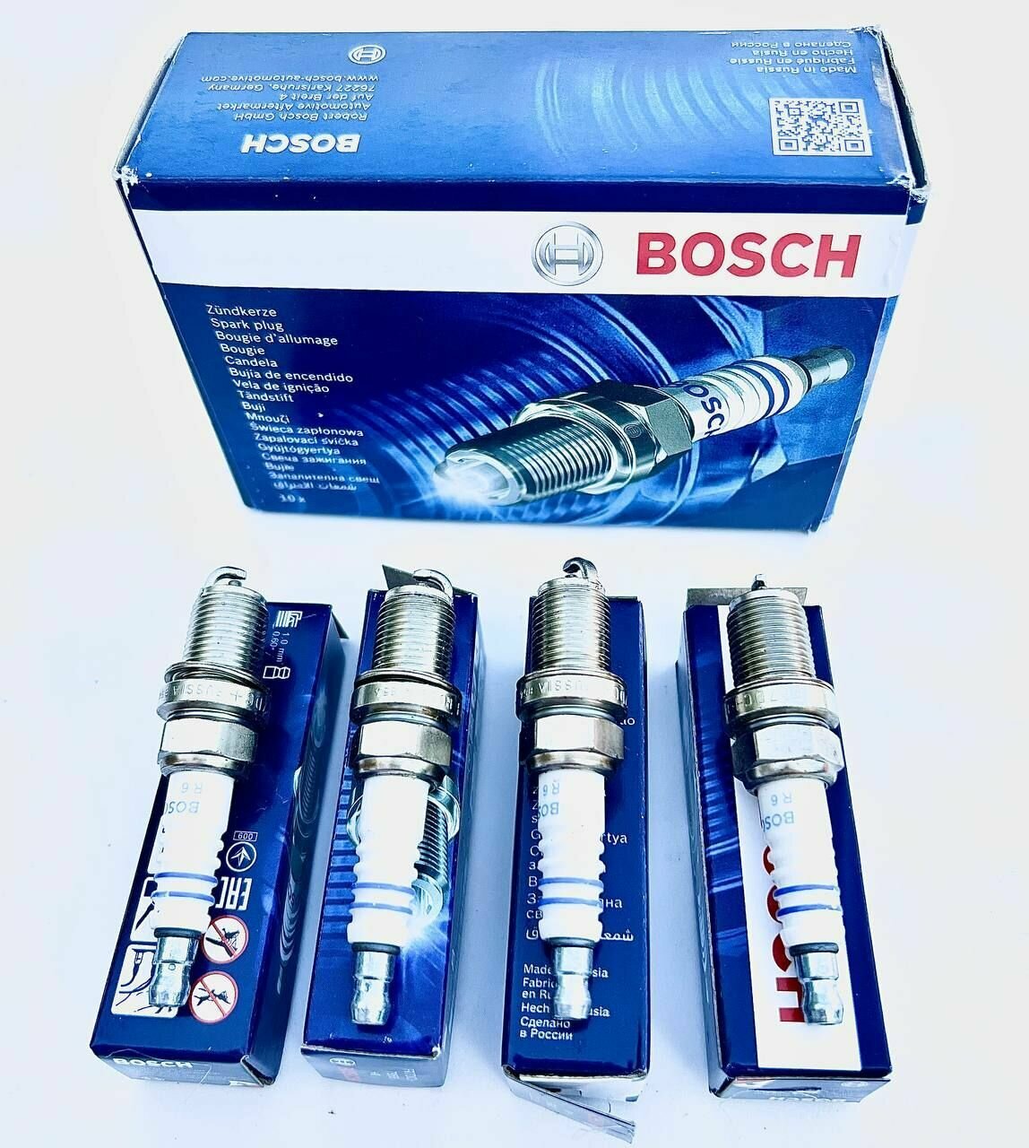 Комплект свечей зажигания Bosch 0242235666 FR7DC+ 4 штуки — фото 5